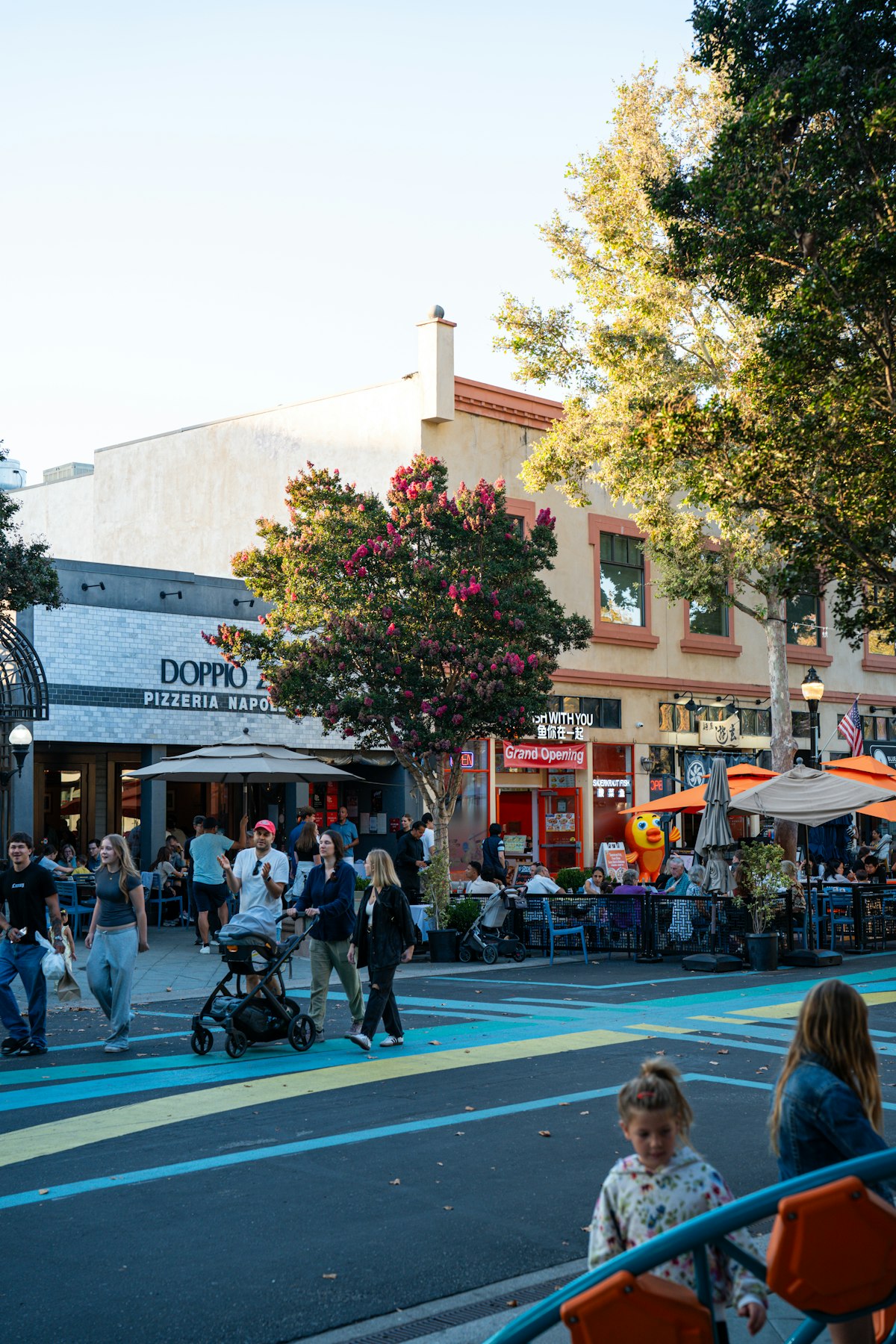 Castro Street in downtown Mountain View California with outdoor dining and tree-lined sidewalks