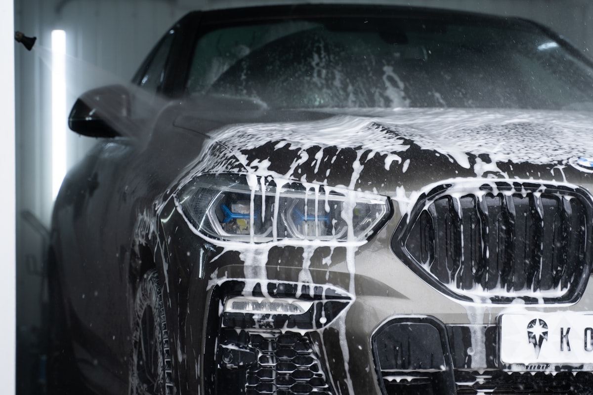 Hand wash suds on a car during professional mobile detailing in Santa Clara